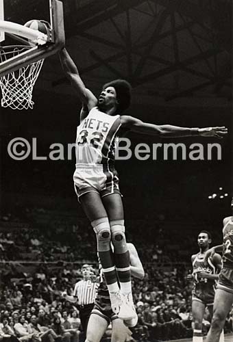 Dr J photograph flying through the air dunking