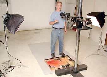Dave Smith photographing Ginny Herzog's painting